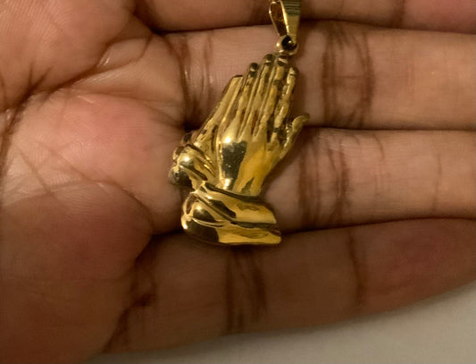 Gold tone praying hands pendant necklace. Stainless steel