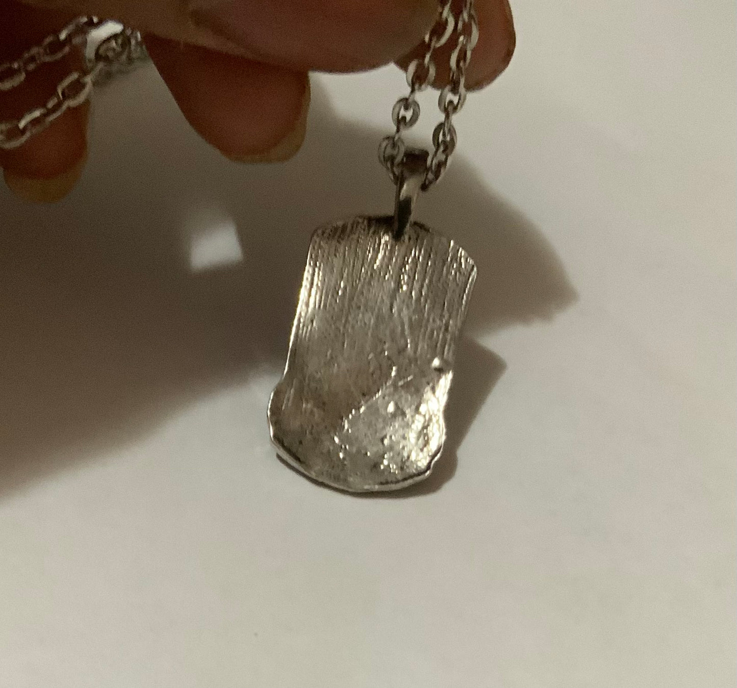 U.S twin towers pendant necklace. Stainless steel. Silver color. Back