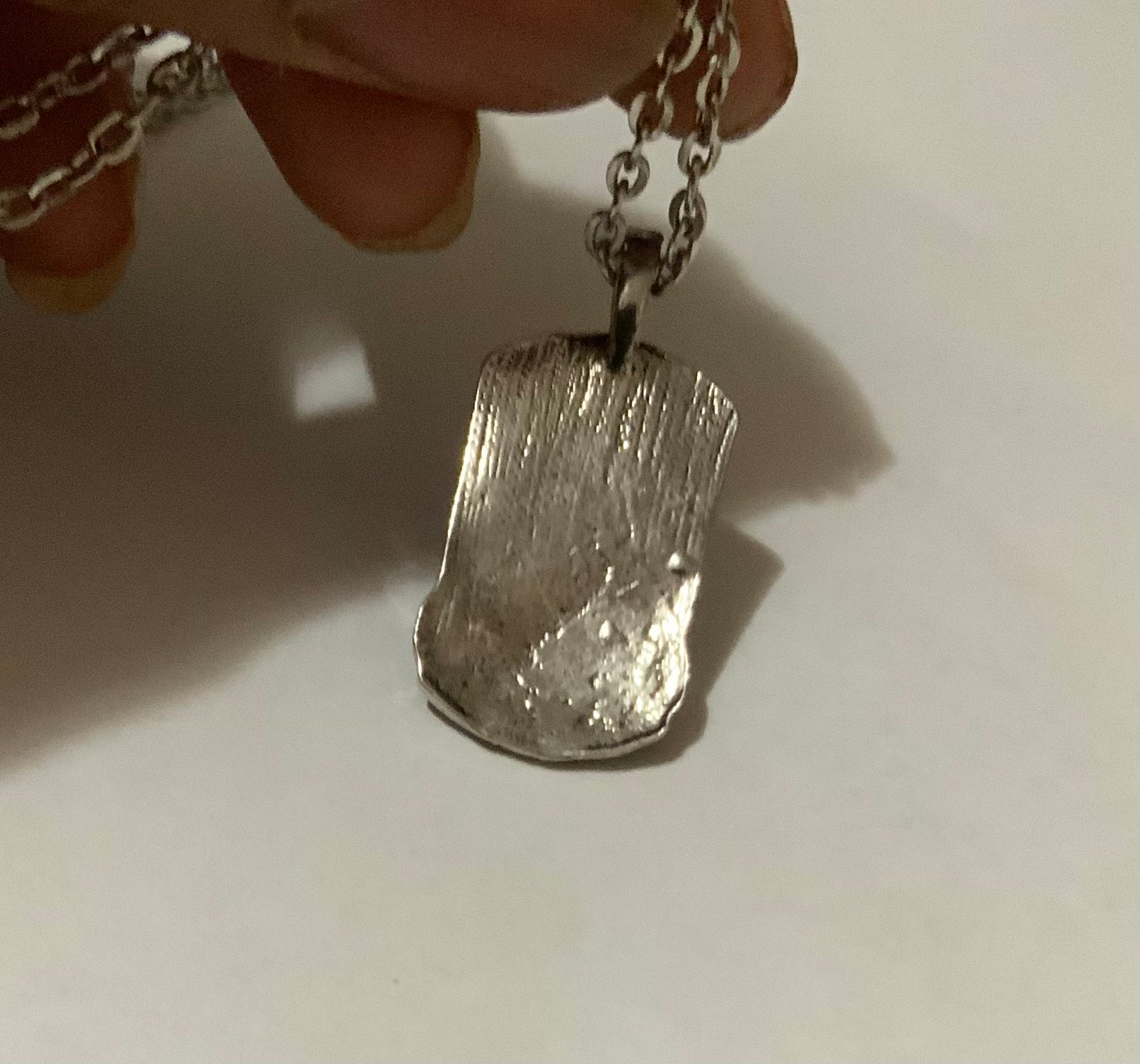 U.S twin towers pendant necklace. Stainless steel. Silver color. Back